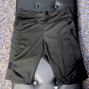 Black biker shorts. Fits great. Size small.